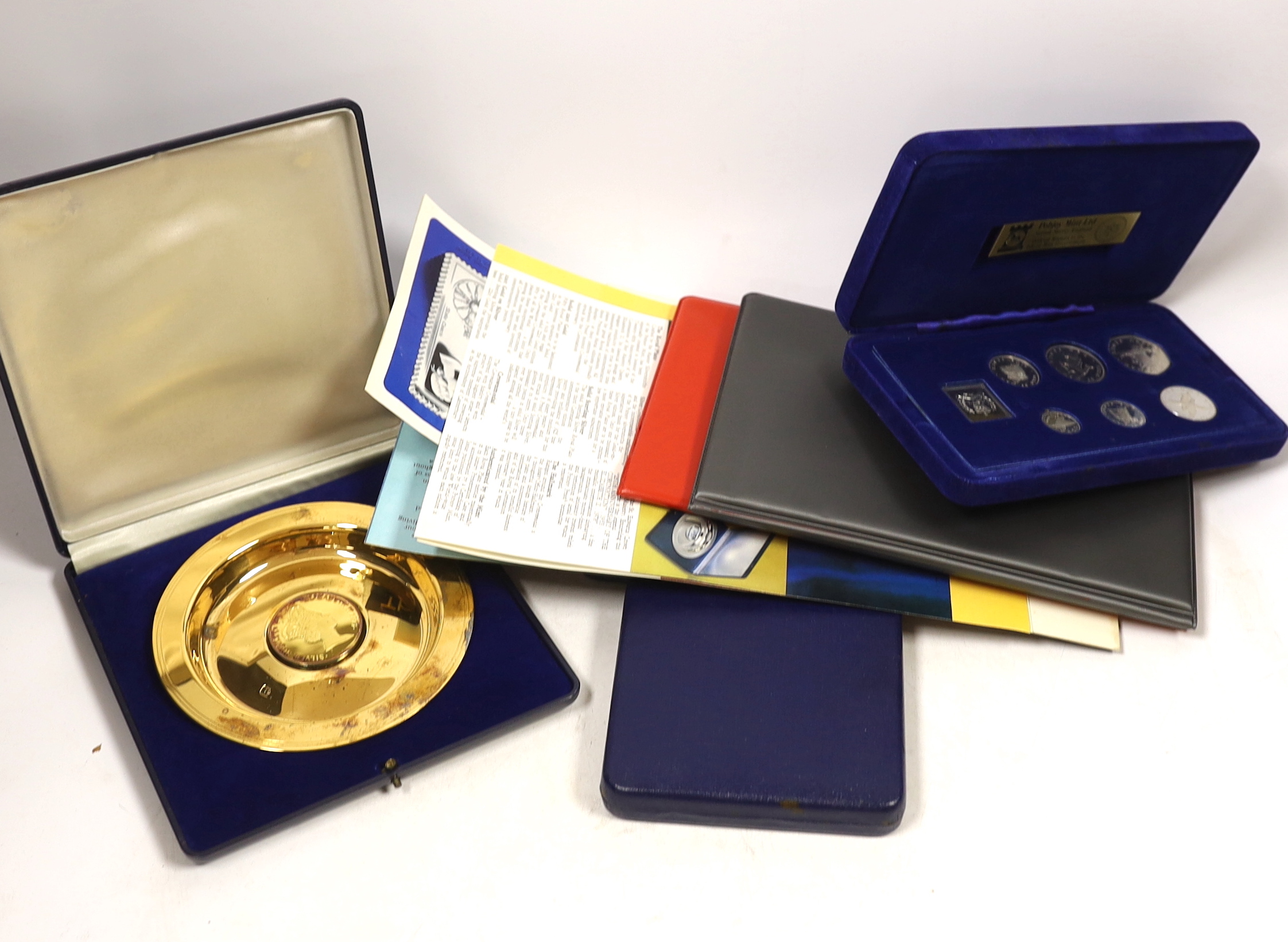 Queen Elizabeth II 1977 Silver Jubilee issues - two medallic first day covers, two cases of South Atlantic Coronation Crowns, cased Isle of Man proof silver coin set for 1977 and a silver gilt dish